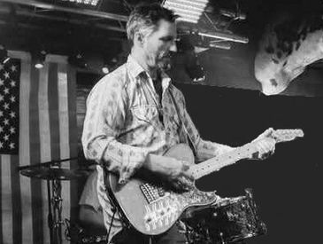 Gene East (Guitars/Vocals)