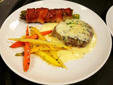 6 oz filet, parmesan sauce, and two side of your choice.
