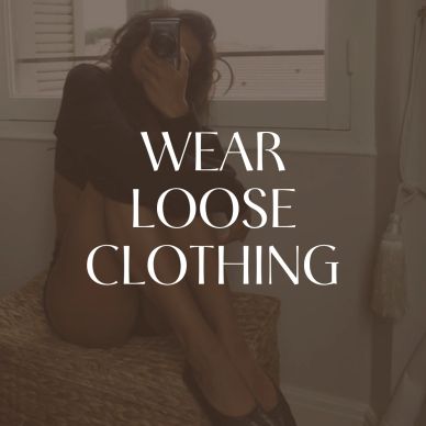 Person taking a mirror selfie with text overlay about wearing loose clothing.