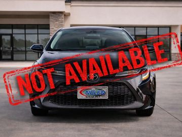 Front view of a black car with 'Not Available' stamped over it.