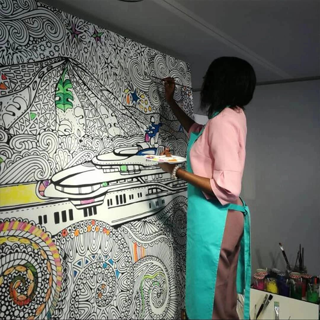 Founder of Live The Blessing expressing herself through art.