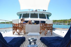 woman lounging on Bonaparte fwd deck