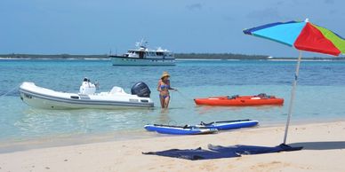 Umbrella on a beach. unique beach setting you get when chartering a yacht