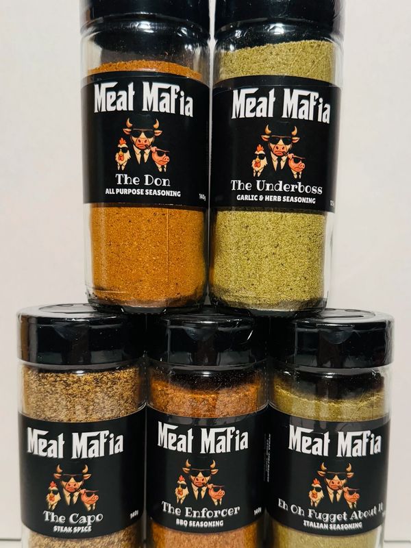 Five Meat Mafia seasoning jars with unique names and flavors.