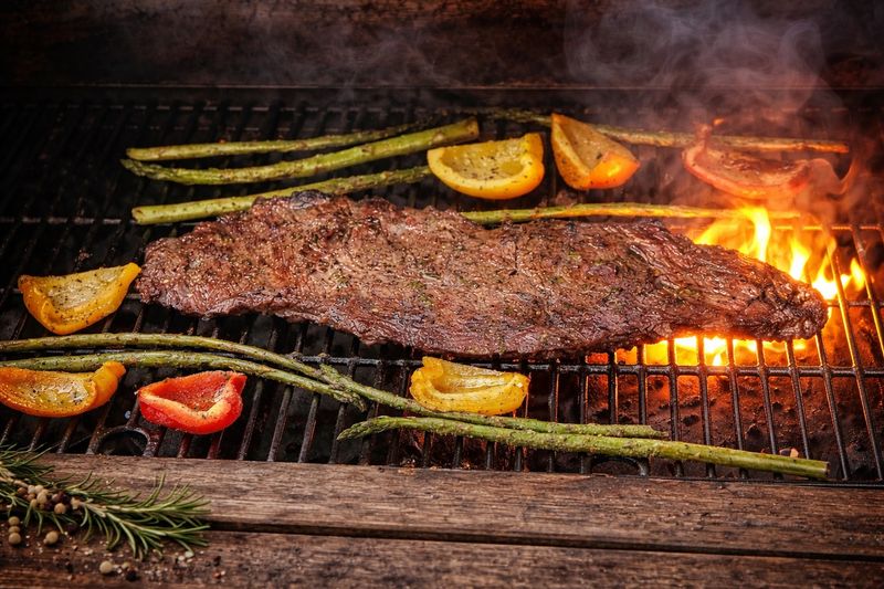 Steak on an open flamed grill