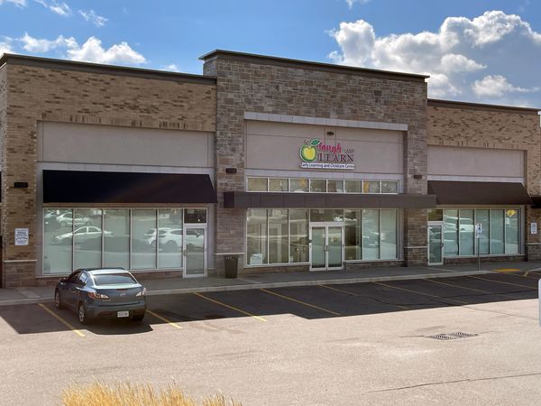 A photograph of an early-learning and childcare centre in a retail plaza.