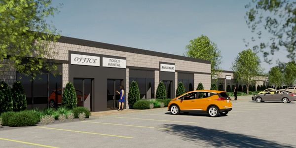 A rendering of a one story business plaza with beige masonry and warm grey stucco entry portals.