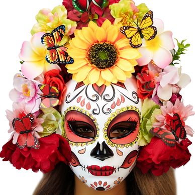 Person wearing a colorful Day of the Dead mask with flowers and butterflies.