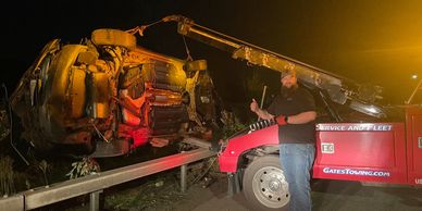 Scott - Towing Manager recovering a vehicle from rolling over the guardrail 