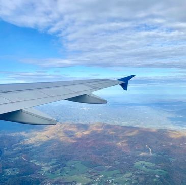 Airplane blue sky clouds airplane view
