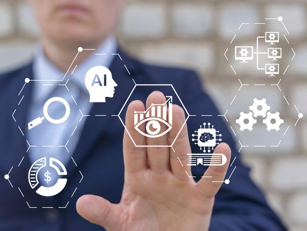 Businessman interacting with AI and data analytics icons on a virtual interface.
