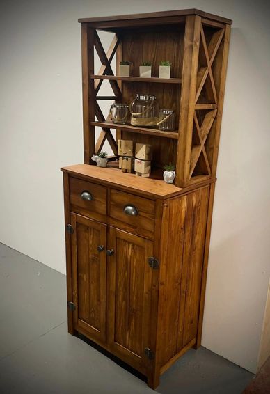 A slim line dresser line dresser with 2 draws & 2 shelves top shelves with cross section framing.