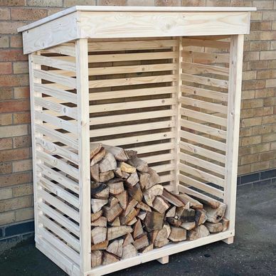 A log store in bare wood ready to be sealed and treated 