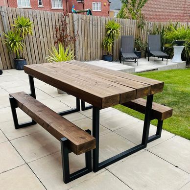 a chunky sleeper table and 2 benches for outdoor use

