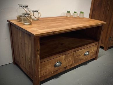 rustic tv unit with a shelf on top and 2 draws on the bottom