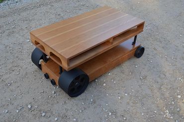 Unique coffee table created in wood and metal.