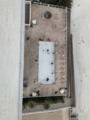 Beach side pool being renovated - looking down from the roof