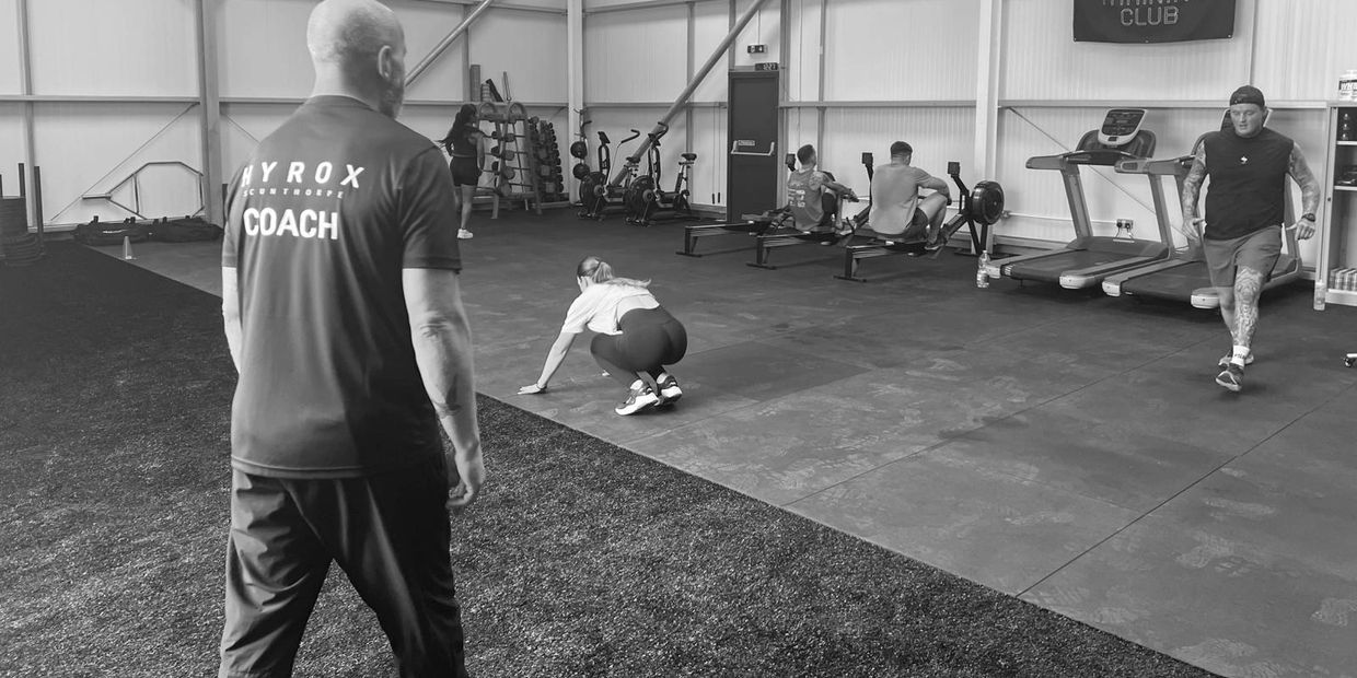 HYROX coach delivering a session
