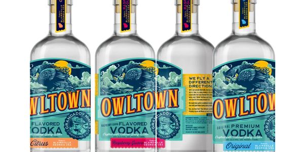 Owl Town Vodka bottles displayed in a way that shows the brand name across multiple bottles.