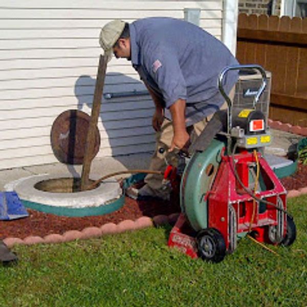 Power rodding the drain lines from the catch basin.