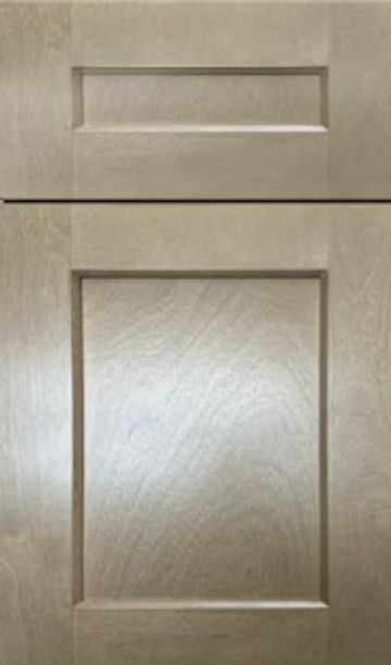 Light wood cabinet door with simple recessed panel design.