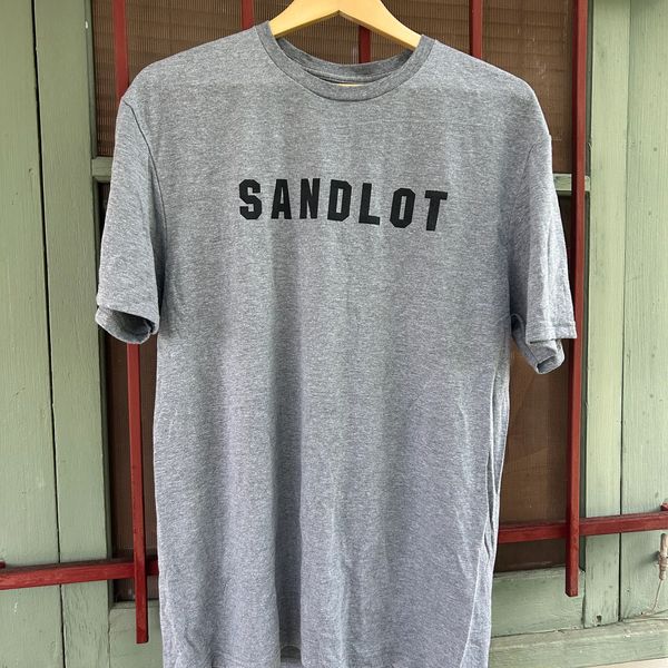 Gray T-shirt with the word 'SANDLOT' printed in black on the front.
