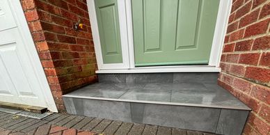 Porcelain tiles on door step by South Downs precision tiling