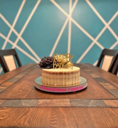 A vanilla cake on a table