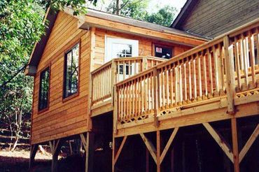 Two-story, western red Cedar addition; master bedroom, and bathroom over an office on the first floo