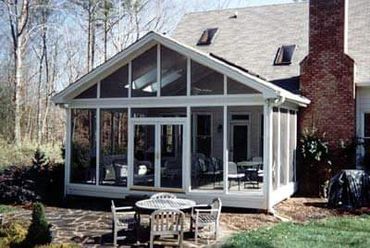 Our Flagship screened-in porch.Double doors handrails 4 Skylights Open Gable Roof design  White trim