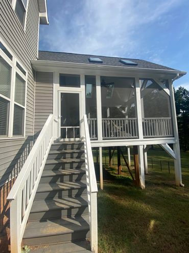 Staircase and Platform Second story Screened Addition Trimmed Painted & Stained New deck Extension