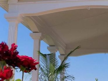 The Carribean: a lean to style Porch roof w/ fluted Columns, Top & Base Capitals, 