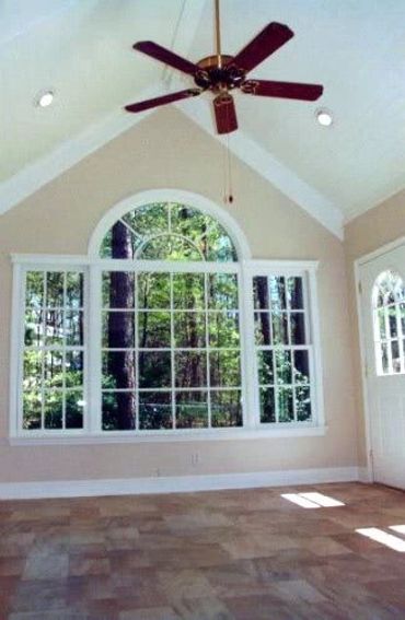 Cary bonus room, Pergo Travertine Flooring w Custom trim and built up Crown molding.