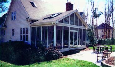 Side view of a screened addition, also known as a screen room, 3-season room or screened-in porch