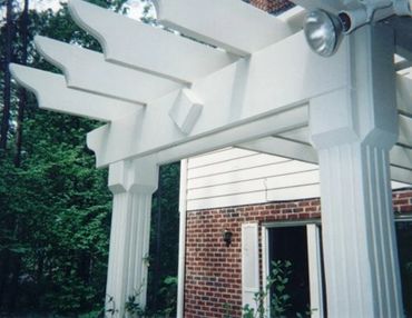 The Casablanca 

North Raleigh country club porch roof with Arbor feature. Fluted Columns, 