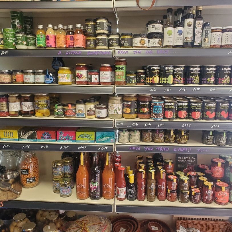 Shelves in shop showing a large array of store cupboard tinned and glassware goods