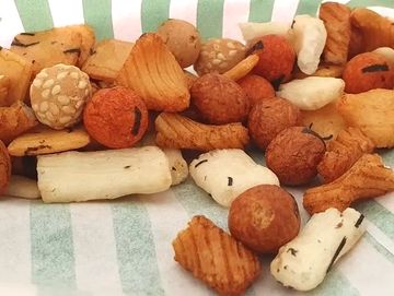 Japanese rice crackers in a paper bag
