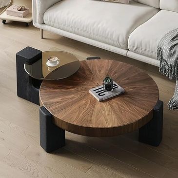 Abstract circular wood and stained glass table including a large wood grain top and a brownish glasso