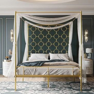 A tall gold bed frame featuring circles on the headboard