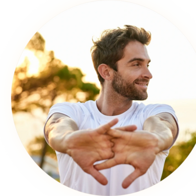 Man stretching outdoors (casual, health-conscious)