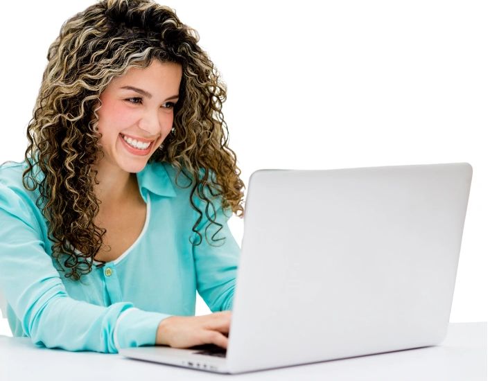 Person smiling using a computer