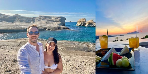 Couple enjoying a sunny beach and vibrant sunset with drinks and fruit.