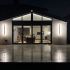 Modern house extension with illuminated exterior walls at night