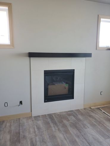 Stained maple floating shelf mantel 