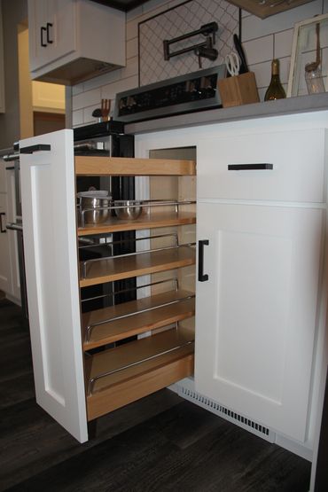 Pull-out spice rack in base cabinet