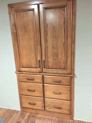 Wall built-ins for hallway that match existing raised paneled cabinetry