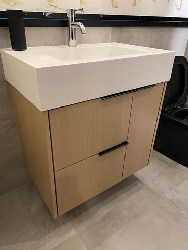 Floating rift sawn white oak vanity with Edgefield finger pull hardware