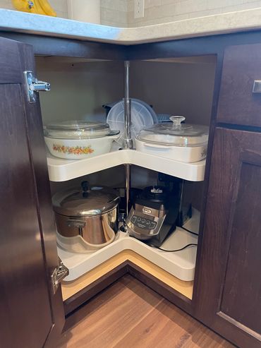 Two-tiered lazy susan cabinet