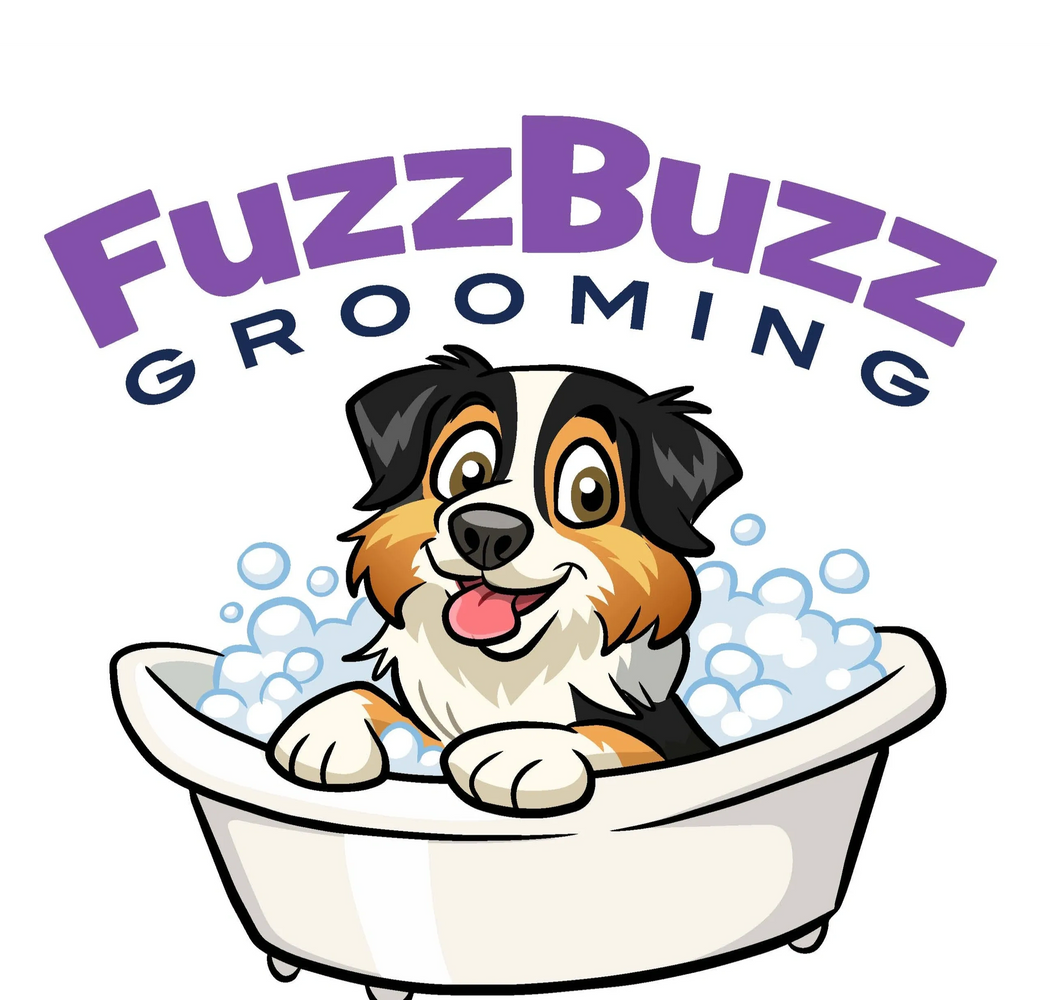 Cute dog enjoying a bubbly bath at FuzzBuzz Grooming.