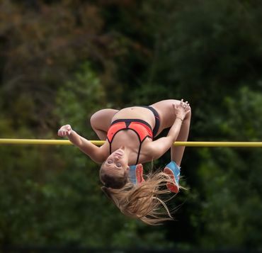 Anna McIlmoyle jumping a clear at Mary Peter's Athletics Track, Belfast.